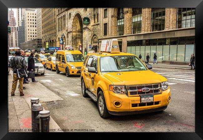 Yellow taxis in New York City  Framed Print by Keith Douglas