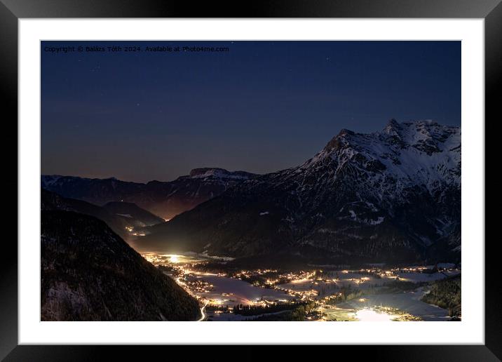 The town and the mountains at night Framed Mounted Print by Balázs Tóth