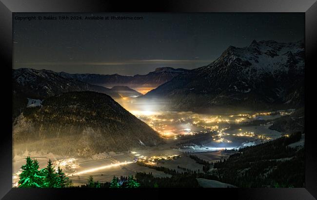 Village between the mountains at night Framed Print by Balázs Tóth