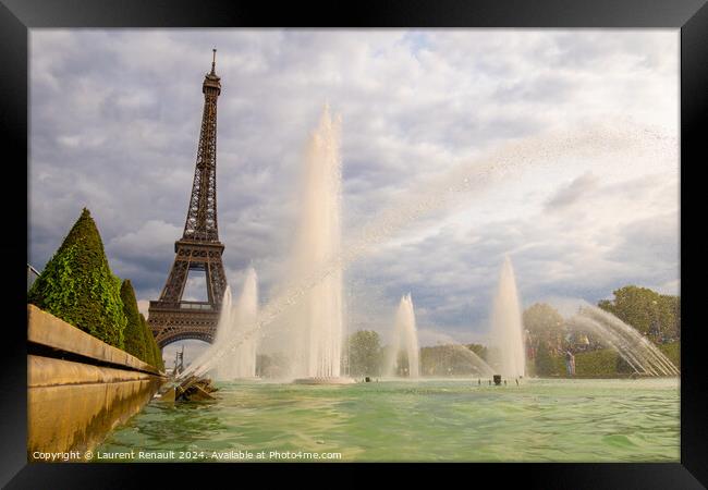 Eiffel Tower viewed through the Trocadero Fountains in Paris Framed Print by Laurent Renault