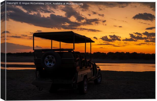 Luangwa River sunset, Zambia Canvas Print by Angus McComiskey