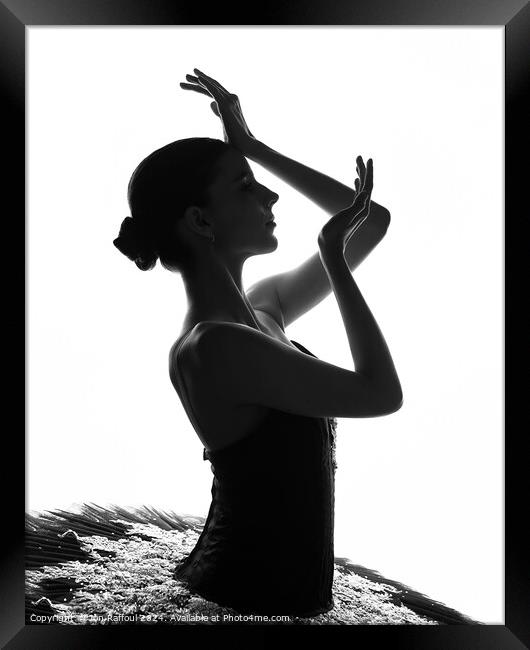 Silhouetted Ballerina  Framed Print by Jon Raffoul
