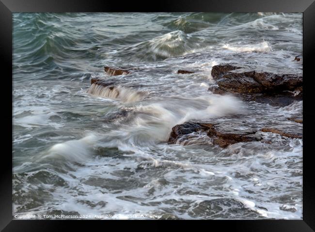 Sea Over Rocks Framed Print by Tom McPherson