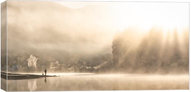 Magical sunrise with reflections over Derwent Water Canvas Print by Julian Carnell