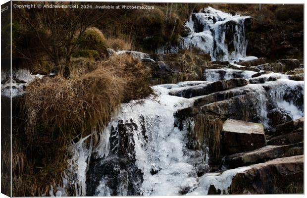 Frozen waterfall at the Beacon Beacons, South Wales UK. Canvas Print by Andrew Bartlett