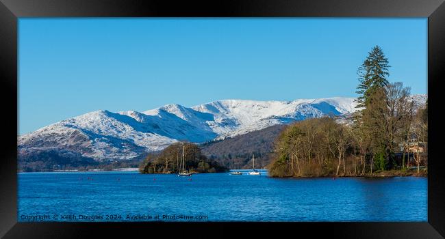 Windermere and the snow covered Lakeland Fells Framed Print by Keith Douglas