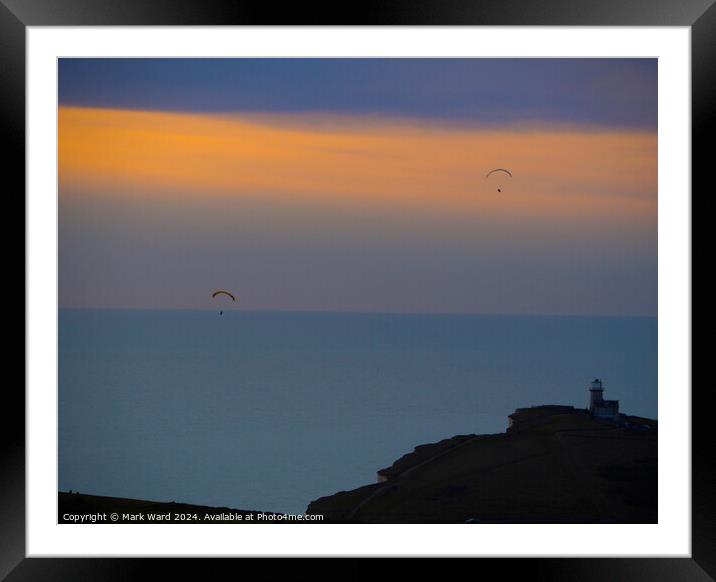 Sunset over Belle Tout . Framed Mounted Print by Mark Ward