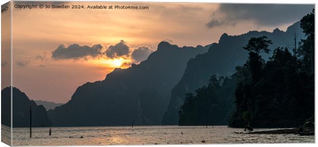 Sun rise over the Cheow Lan Lake, Khao Sok, Thaila Canvas Print by Jo Sowden