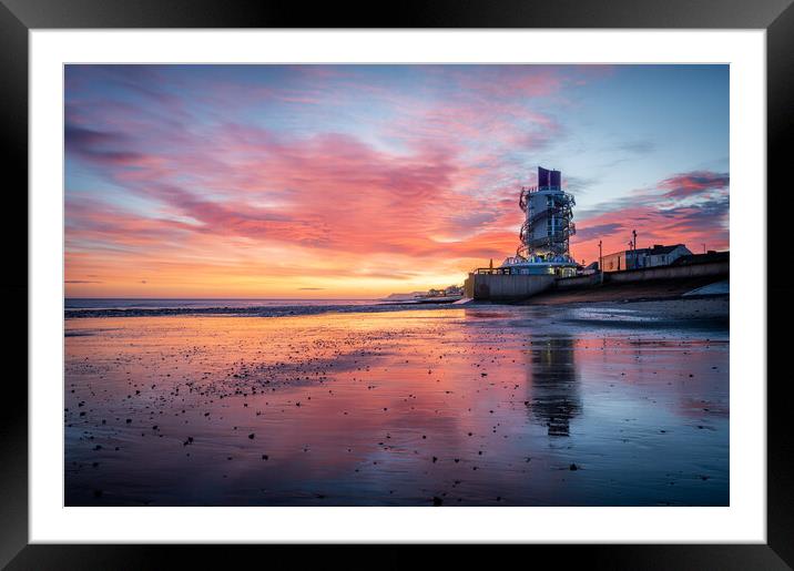 A glorious sunrise over redcar beacon Framed Mounted Print by Kevin Winter