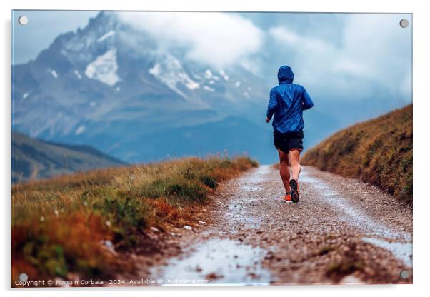 A mountain runner enjoys the trails, a day of rain Acrylic by Joaquin Corbalan