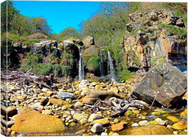 Hayburn Wyke waterfall, Scarborough Yorkshire. Canvas Print by john hill