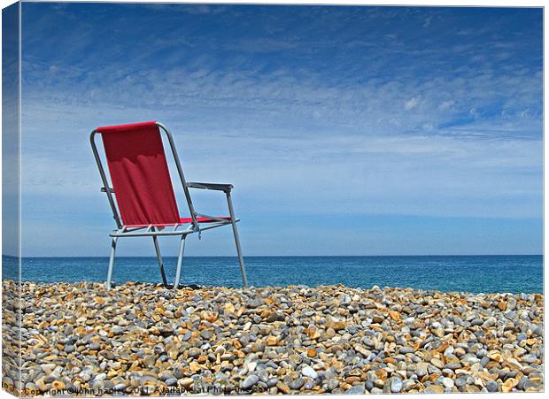 Waiting at Weybourne- Red Chair left on the Beach Canvas Print by john hartley