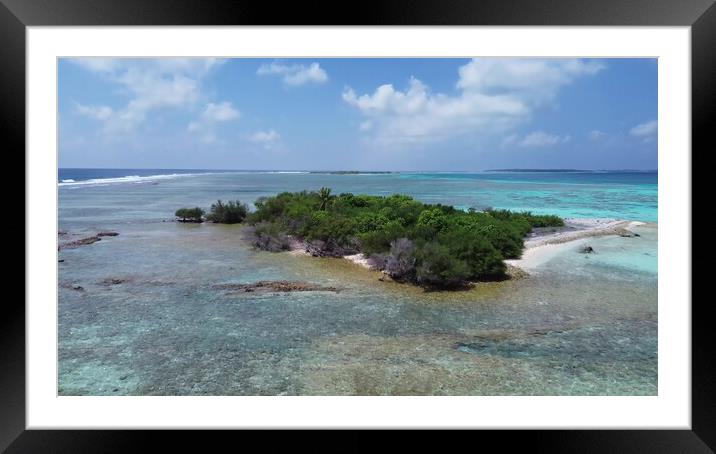 Drone view of paradise islands of the Maldives with coral reefs  Framed Mounted Print by Michael Piepgras