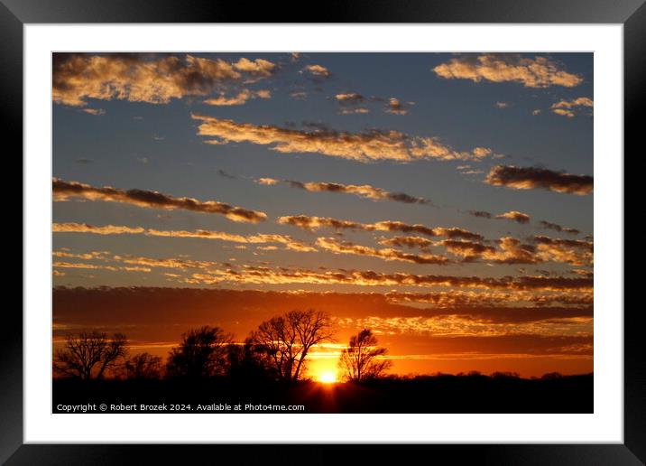 Sunset with a colorful sky Framed Mounted Print by Robert Brozek