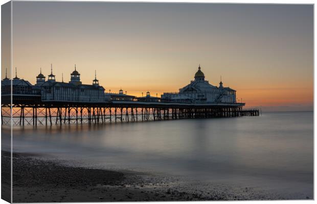 Sunrise at Eastbourne Pier, Sussex, England Canvas Print by Dave Collins