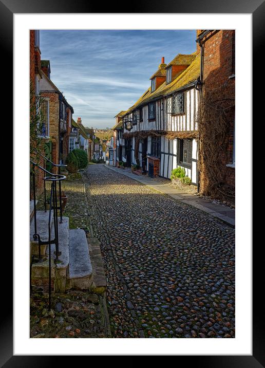 Outdoor narrow cobbled street in Rye Sussex UK Framed Mounted Print by John Gilham