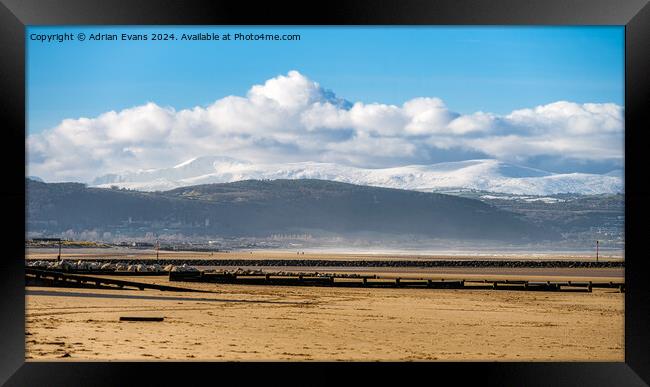 Snowdonia from Rhyl Beach Framed Print by Adrian Evans