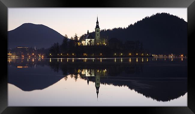 Dawn breaks over Lake Bled Framed Print by Ian Middleton