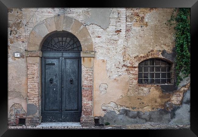 Stately aged door in Tuscany Framed Print by Paul Edney
