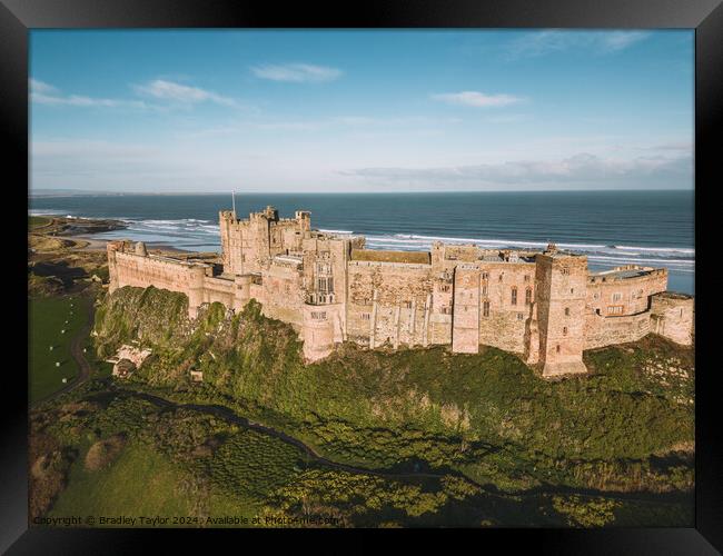 Aerial View of Bamburgh Castle, Northumberland Framed Print by Bradley Taylor