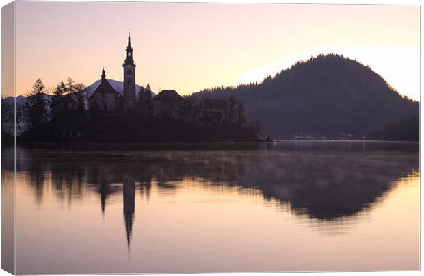 Sunrise over Lake Bled Canvas Print by Ian Middleton