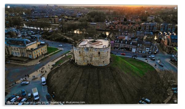 Aerial view of a historic circular stone fortress at dusk, with surrounding urban landscape and sunset sky in York, North Yorkshire Acrylic by Man And Life