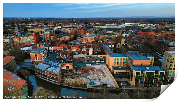 Aerial view of a modern cityscape during sunset with buildings and a river in York, North Yorkshire Print by Man And Life
