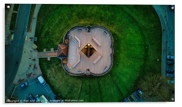 Aerial view of a unique star-shaped building surrounded by green lawns at dusk in York, North Yorkshire Acrylic by Man And Life