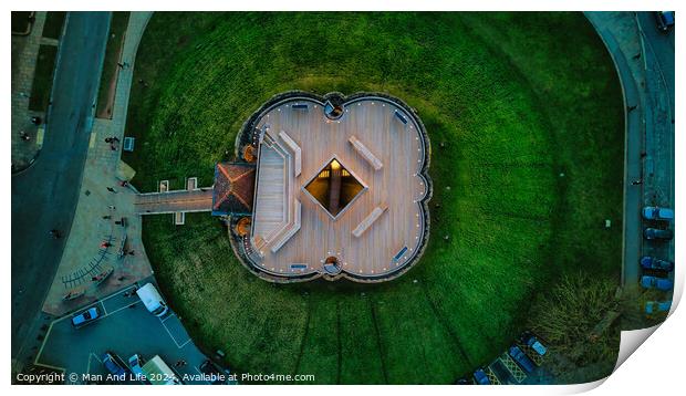 Aerial view of a unique star-shaped building surrounded by green lawns at dusk in York, North Yorkshire Print by Man And Life
