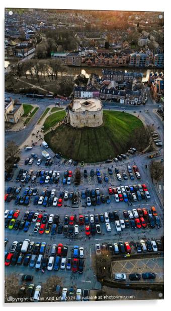 Aerial view of a circular building surrounded by a parking lot with cars during twilight in York, North Yorkshire Acrylic by Man And Life