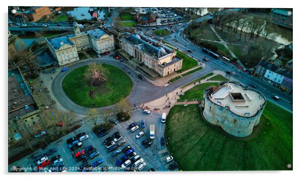 Aerial view of a historic cityscape with a roundabout, ancient buildings, and a fortress at dusk in York, North Yorkshire Acrylic by Man And Life