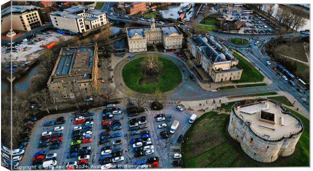 Aerial view of a historic city center with old buildings, a park, and a parking lot at dusk in York, North Yorkshire Canvas Print by Man And Life