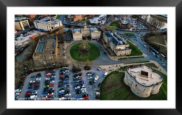 Aerial view of a historic city center with old buildings, a park, and a parking lot at dusk in York, North Yorkshire Framed Mounted Print by Man And Life