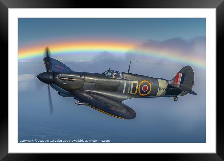 A spitfire flies through the sky with a vivid rain Framed Mounted Print by Joaquin Corbalan