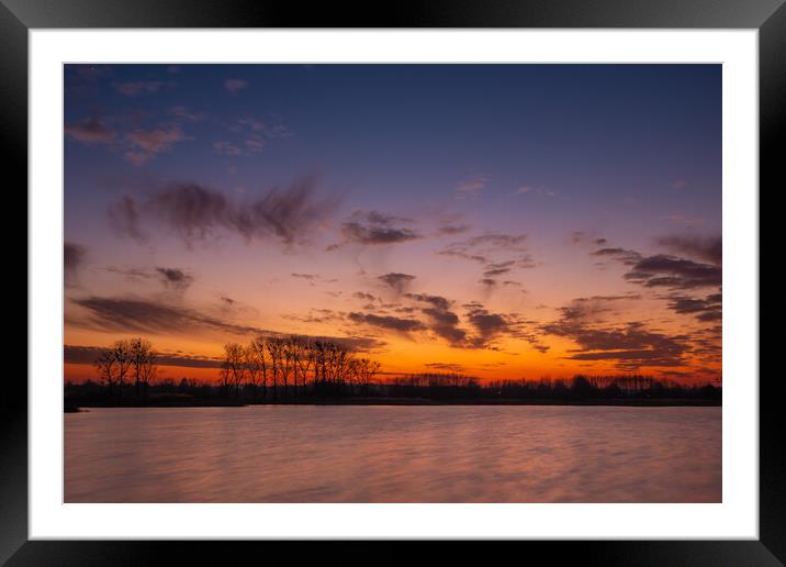 Colorful evening sky after sunset over the lake Framed Mounted Print by Dariusz Banaszuk