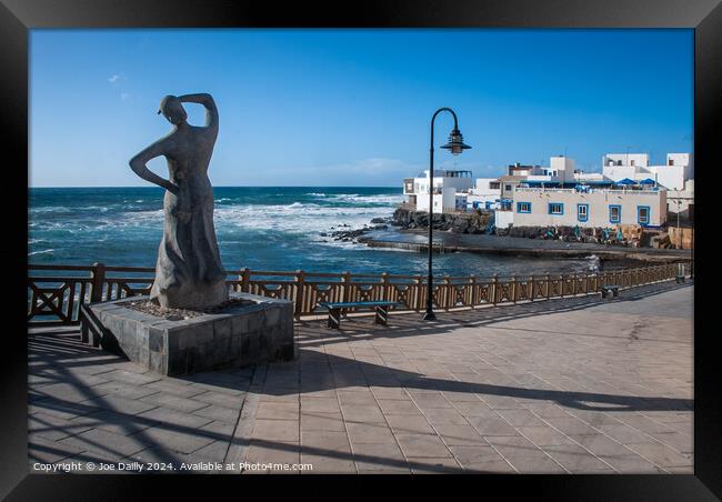 Fishermans wife Statue El Cotillo Fuertaventura  Framed Print by Joe Dailly