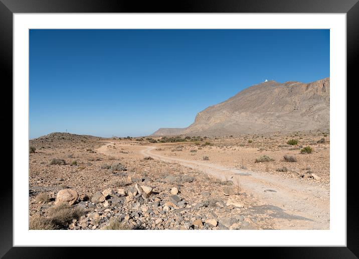Track through the desert Harim mountains  in Musandam, Oman Framed Mounted Print by Dave Collins