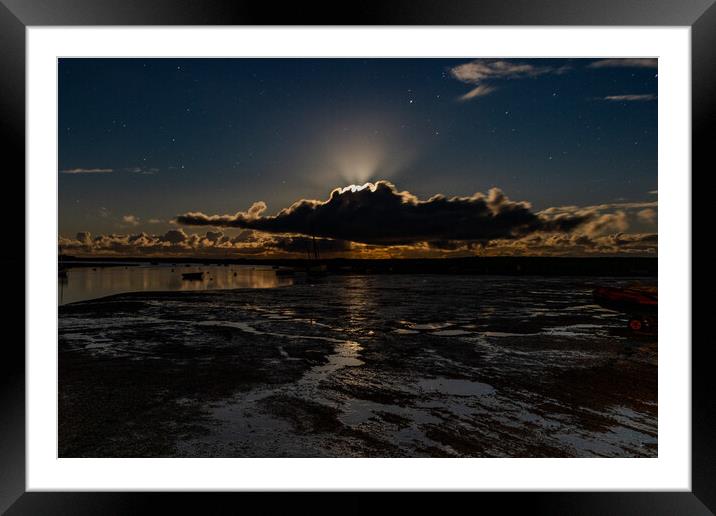 A sunset over a body of water Framed Mounted Print by Sam Owen