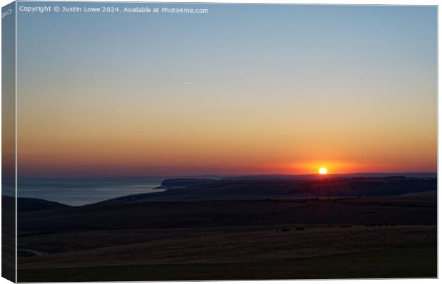 Sun set over the Downs Canvas Print by Justin Lowe