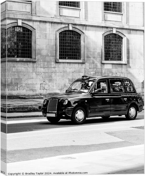 Iconic Black London Taxi in Black and White Canvas Print by Bradley Taylor
