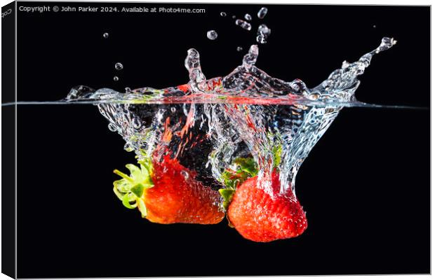 Splash Strawberries Canvas Print by John Parker