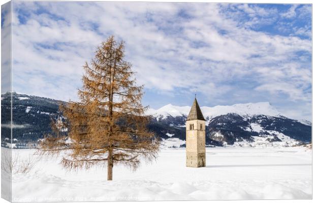 Resia Lake with the sunken church tower in winter Canvas Print by Melanie Viola