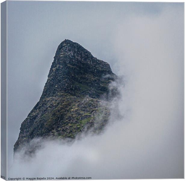 Mountain covered with clouds  Canvas Print by Maggie Bajada