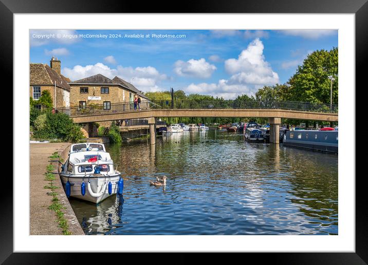Boats moored on the River Great Ouse at Ely Framed Mounted Print by Angus McComiskey