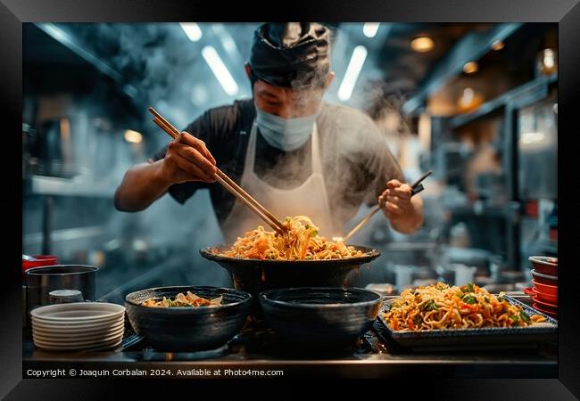 A man is seen in a kitchen using chopsticks to prepare food, possibly Japanese ramen. He is focused on the task at hand. Framed Print by Joaquin Corbalan