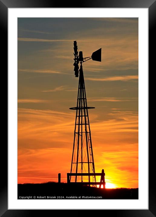 Kansas Golden Sky with clouds with a Farm Windmill silhouette Framed Mounted Print by Robert Brozek