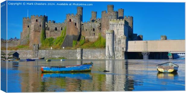 Beautiful Conwy Castle and boats on a February day Canvas Print by Mark Chesters