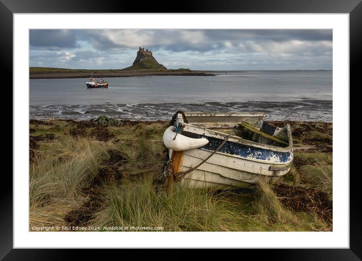 Beached boat on Lindesfarne, Northumberland, England, UK Framed Mounted Print by Paul Edney