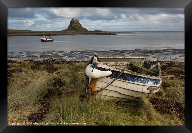 Beached boat on Lindesfarne, Northumberland, England, UK Framed Print by Paul Edney