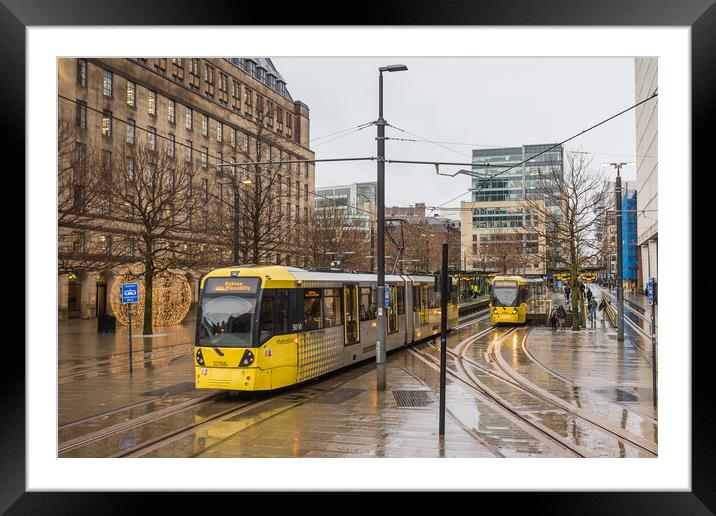 Trams passing in Manchester city centre Framed Mounted Print by Jason Wells